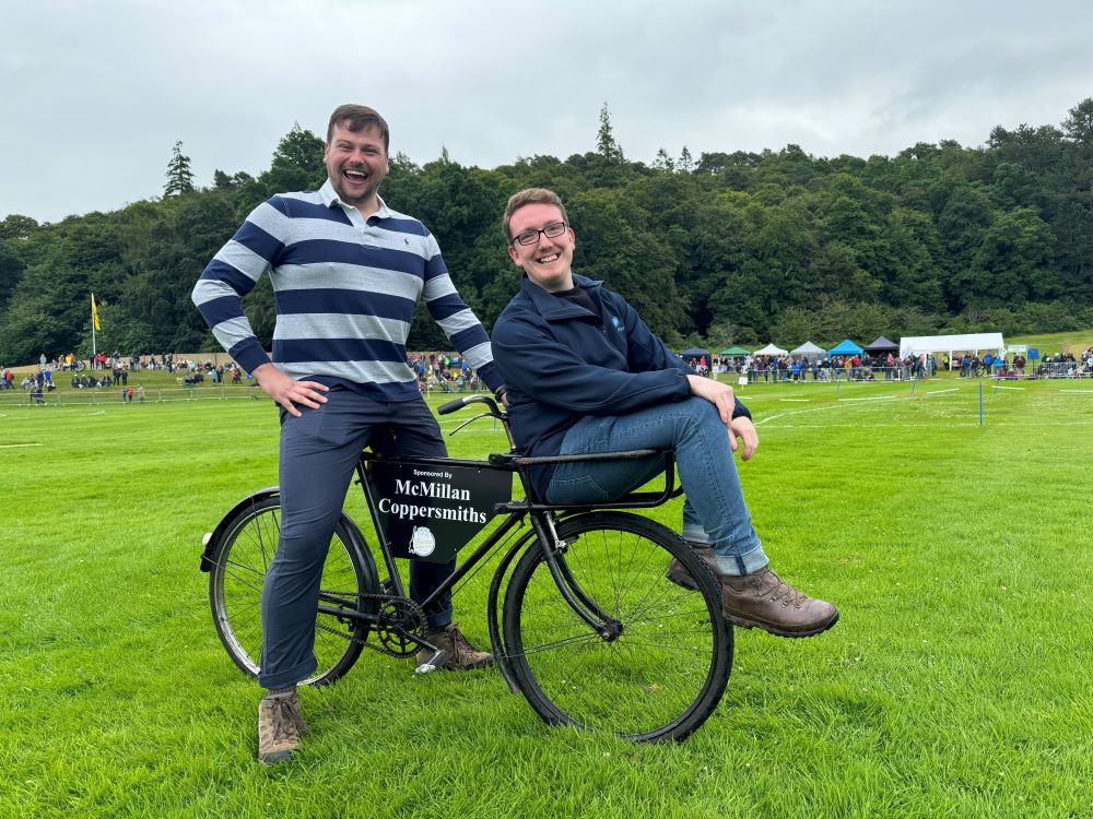 picture of sponsored McMillan Coppersmiths bike at Forres Highland Games